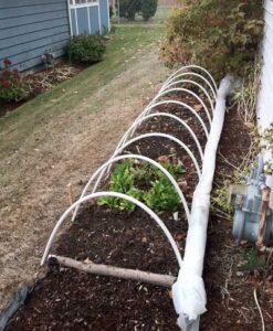 Low Tunnel Construction: How to Build a Mini Hoop House Image